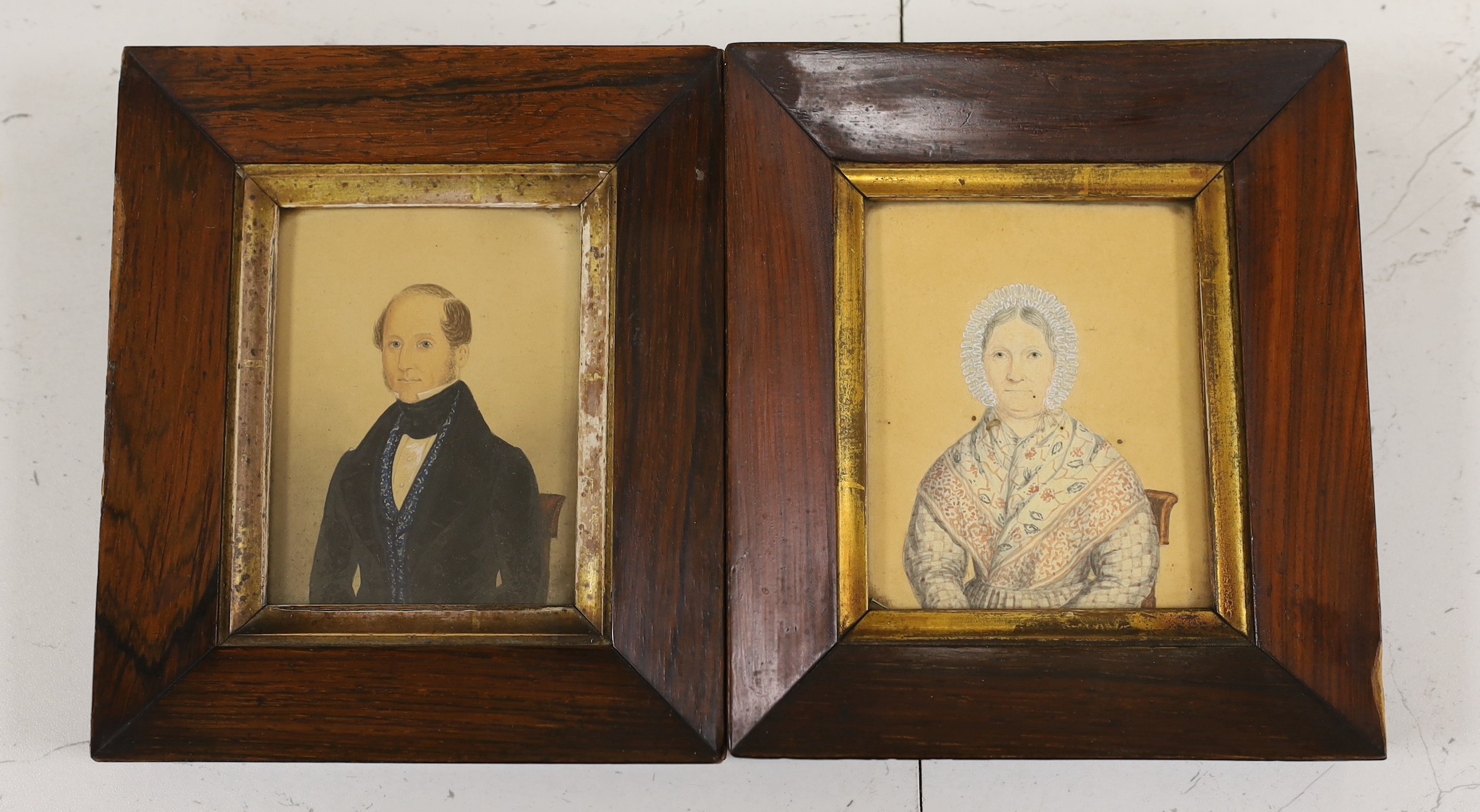 English School, mid 19th century, pair of watercolour miniatures, A Lady and A Gentleman, in rosewood frames, 10 x 8.5cm